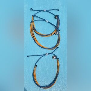 3 royal blue and orange Pura Vida bracelets. $5 each.